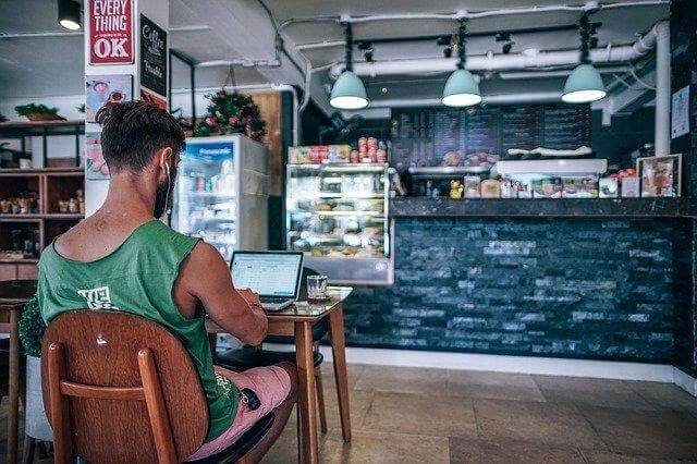 A person sitting at a table

Description automatically generated with low confidence